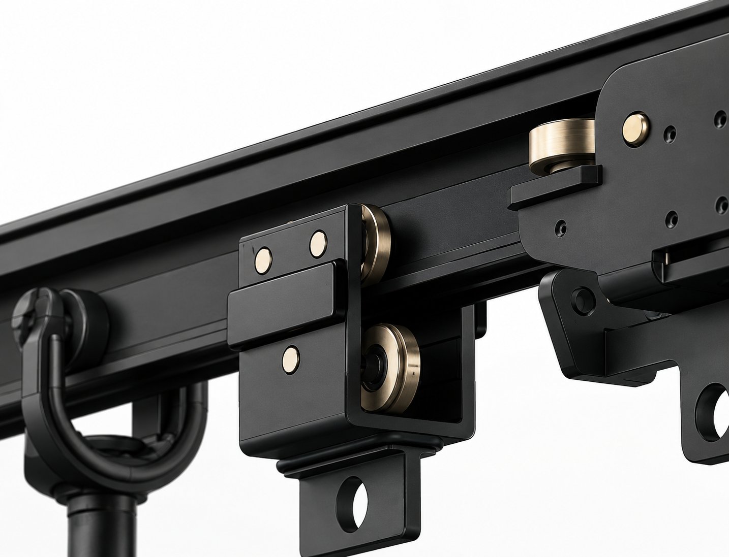 Heavy stage curtain track and carriages — black powder-coated rail with brushed brass rollers