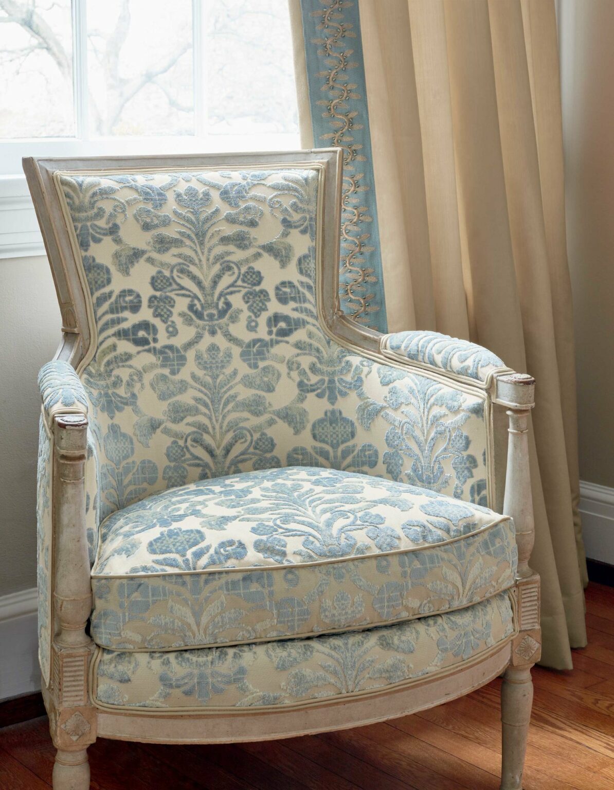 Restored bergère armchair in blue and cream damask