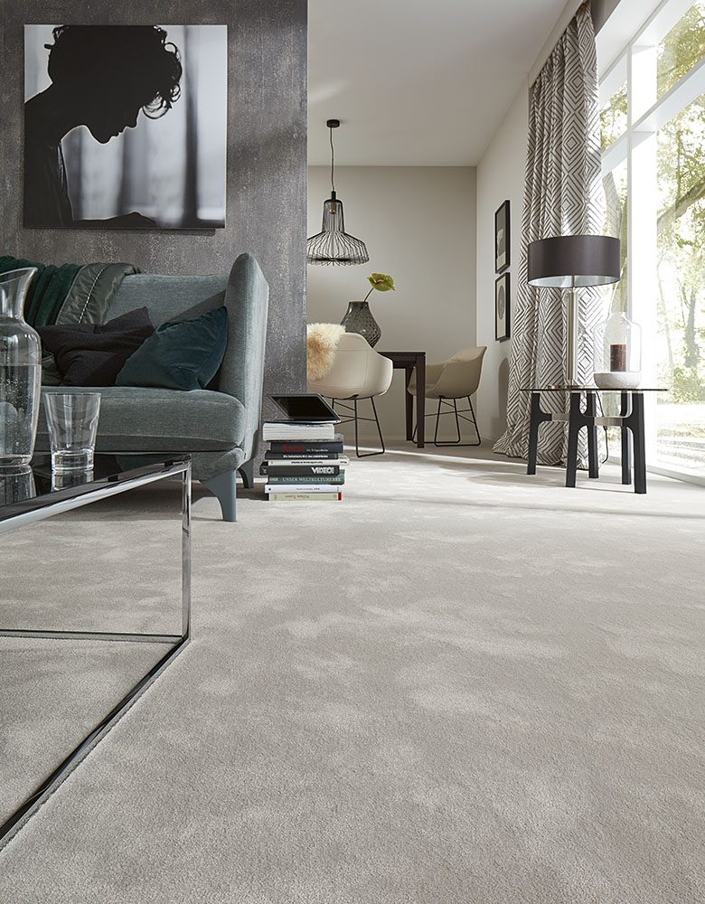 Living room laid with a soft pale broadloom wool carpet