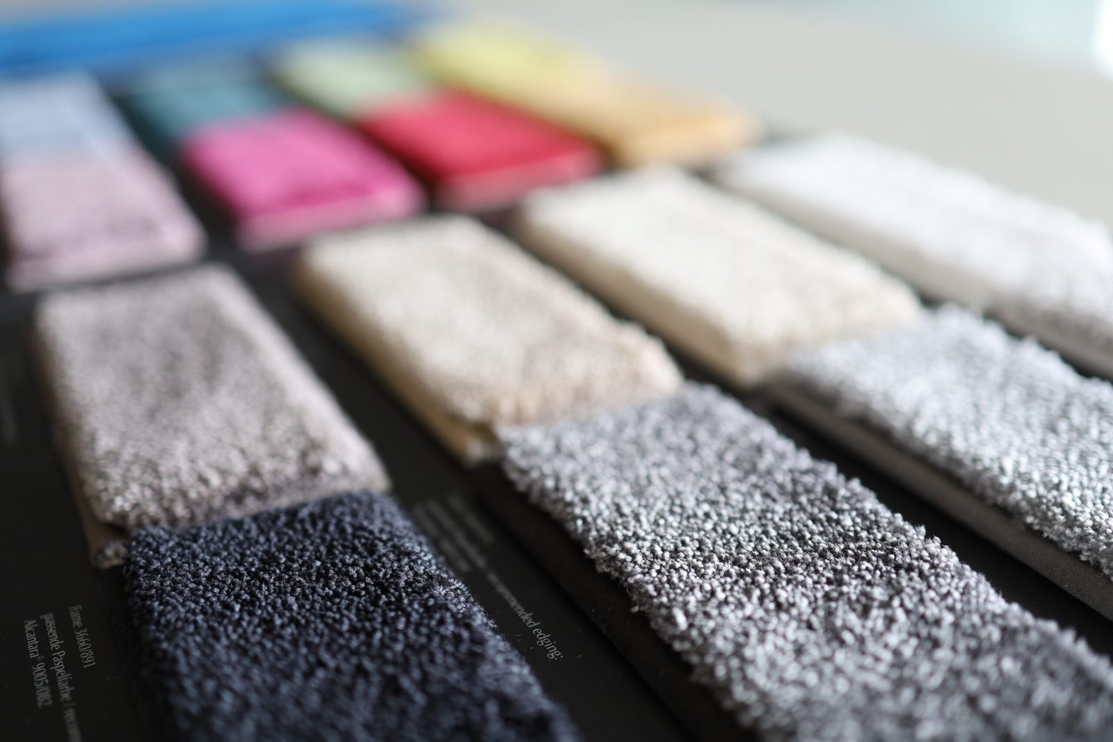 Carpet pile swatches in a range of colours and textures