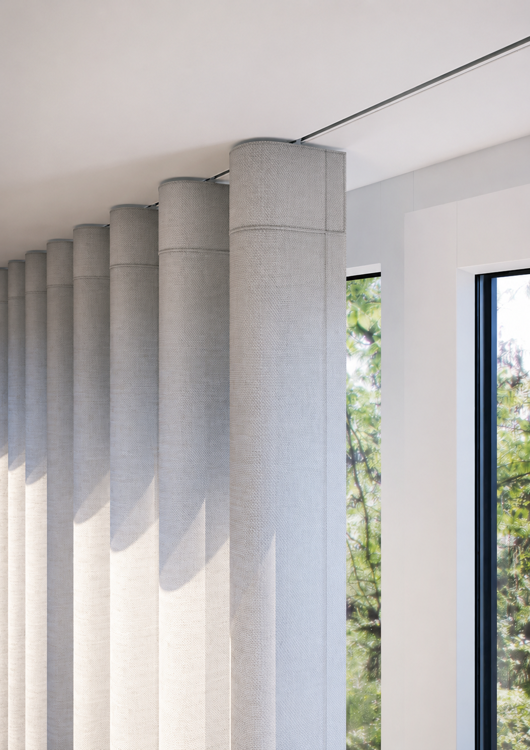 Curtain track curved around a corner, recessed into the ceiling